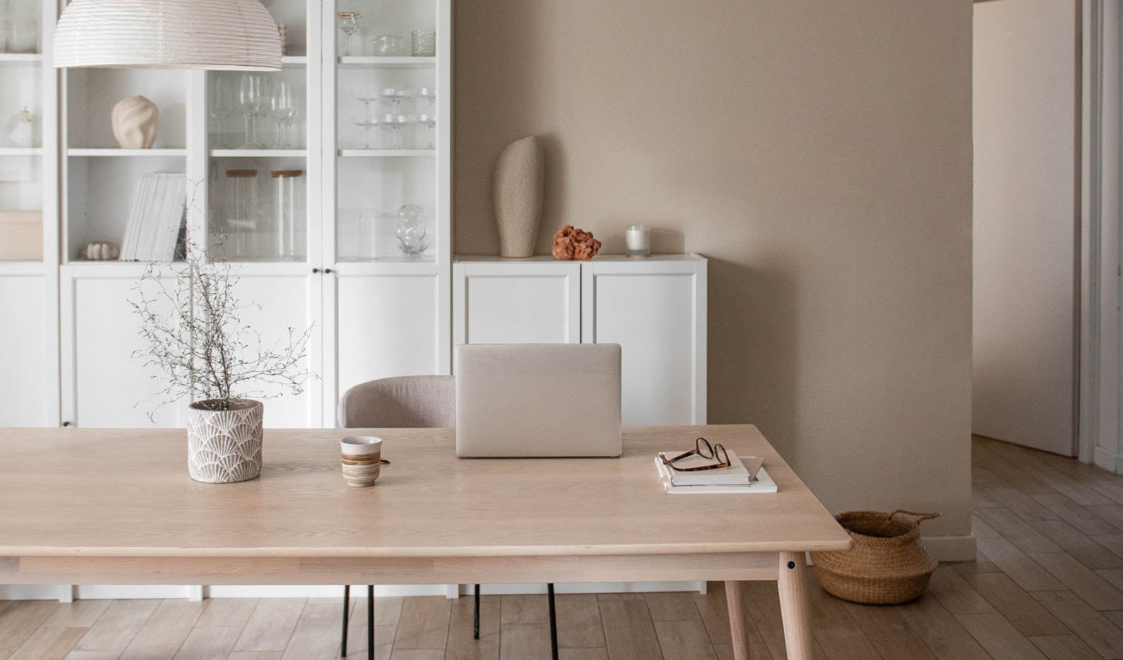 A minimalist computer setup on a clean desk in a bright home office—representing clarity, focus, and aligned digital workspaces.